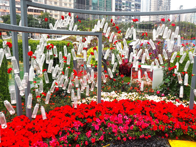 Flower art installation with plastic bottles and roses at Hong Kong Flower Festival 2017