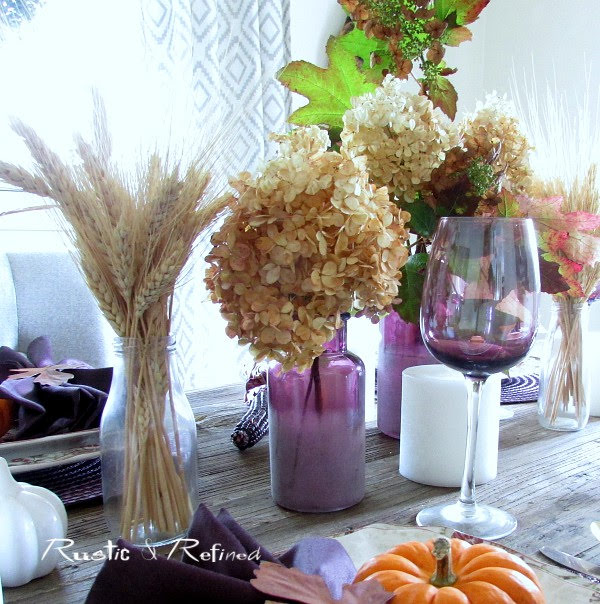 Beautiful Fall Tablescape for Fall or Autumn using a quick and easy centerpiece with square modern dishes.