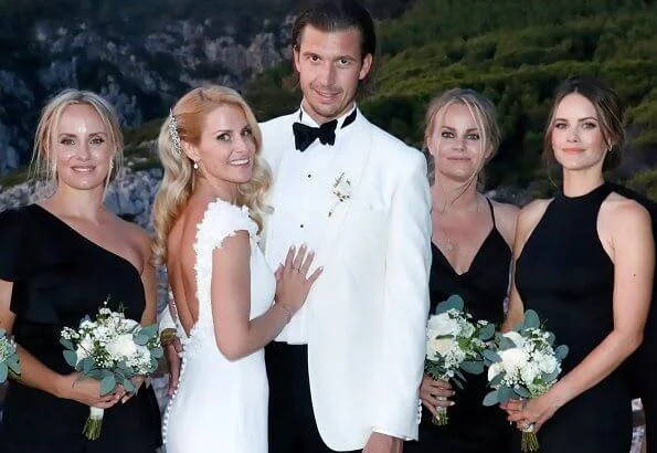 The wedding took place on Capri island. Prince Alexander and Gabriel. Carolina Pihl is the godparent. wedding dress