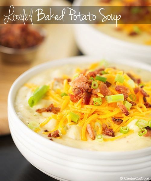 Ultimate Loaded Baked Potato Soup with tender potato chunks, fresh sharp cheddar cheese, crispy bacon, and green onion for garnish!