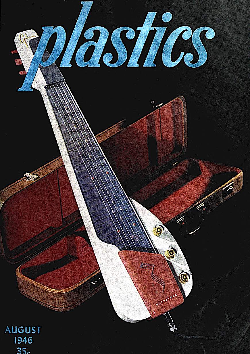 1946 Gibson steel guita a color photograph of a 1946 Gibson steel guitar with plastic body