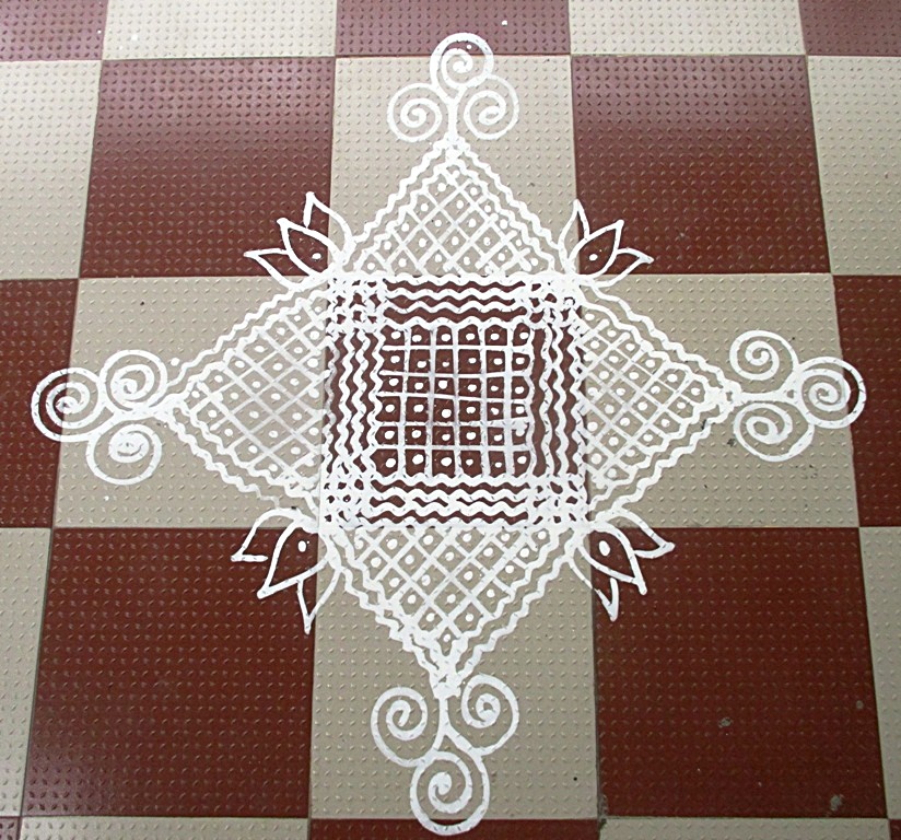 Demo kolam of wet rice flour Makkolam