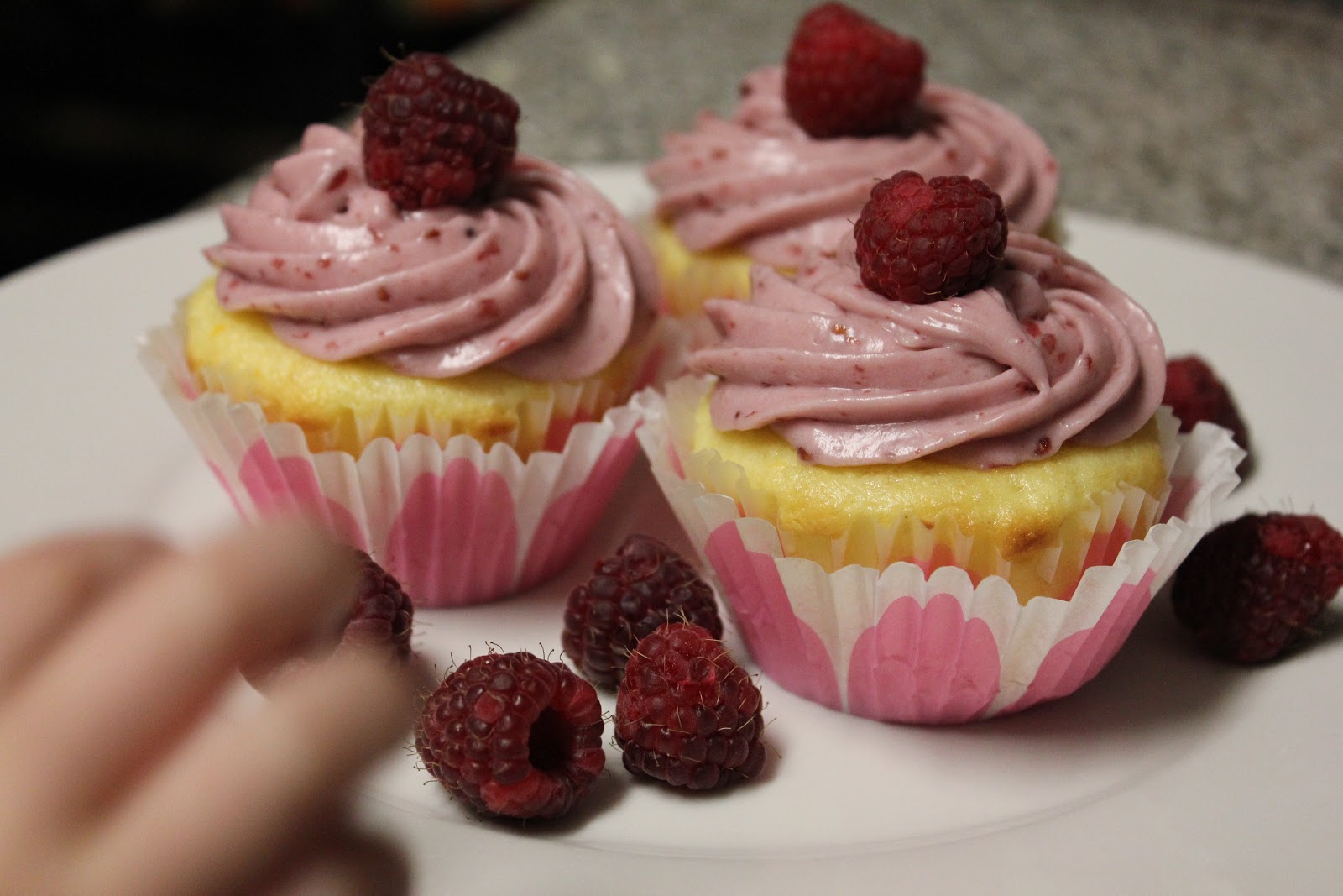 Girls in Aprons: Orange cupcakes with raspberry cream cheese frosting