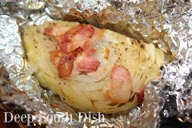 Wedges of cabbage, seasoned, sprinkled with bacon, and wrapped tightly in foil packets, great for the oven, campfire or grill.