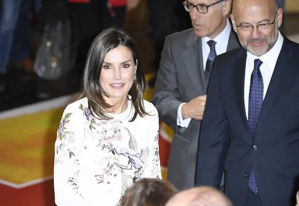 Queen Letizia wore a tall floral and bird embroidery midi dress by Asos Design. Letizia is wearing a Asos floral dress