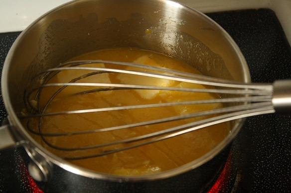 egg yolks and a whisk