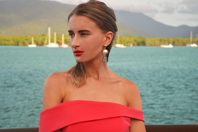 off shoulder neckline with statement pearl drop earrings off shoulder neckline with statement pearl drop earrings