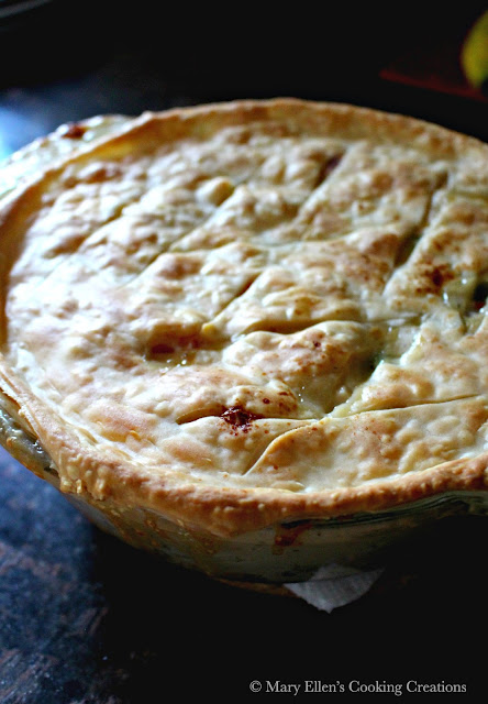 Classic Chicken Pot Pie - the ultimate comfort food. Creamy chicken and veggies with a flaky, golden crust. No cream soup recipe.