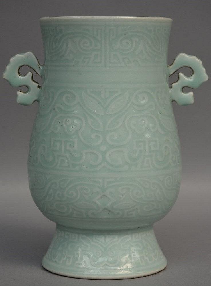 Chinese celadon vase, decorated with symbols, marked Kangxi