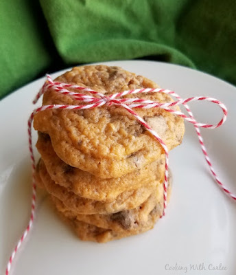 Soft and buttery cookies that are loaded with butterscotch and toffee. Grab your glass of milk and a plate of these super soft pudding filled cookies for a deliciously sweet treat. close up stack of cookies