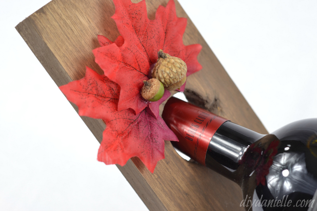 Love this super cute Fall themed balancing wine holder! It's a simple project and you'll love the carving details. Fall Themed Balancing Wine Holder
