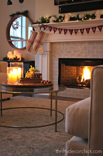 white fireplace with light gray tile
