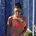  Kourtney Kardashian caught some rays in a skimpy bright two piece in Cabo