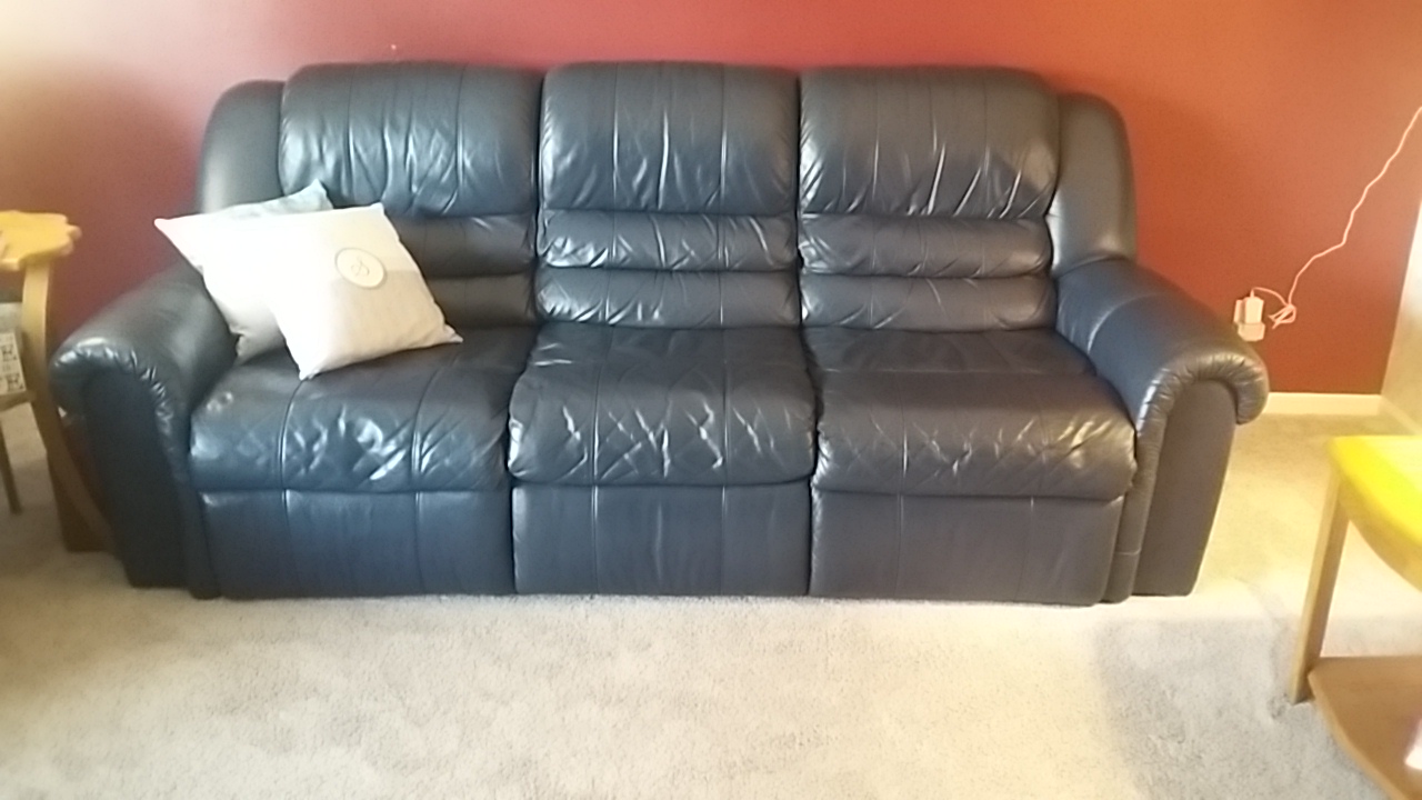 Restoration News Blue Leather Sofa