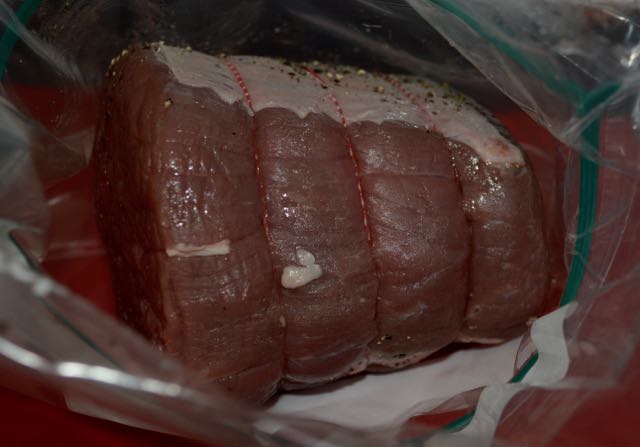 Beef being prepared for sous vide