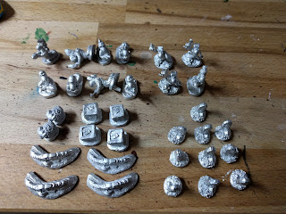 Array of unpainted worms minis