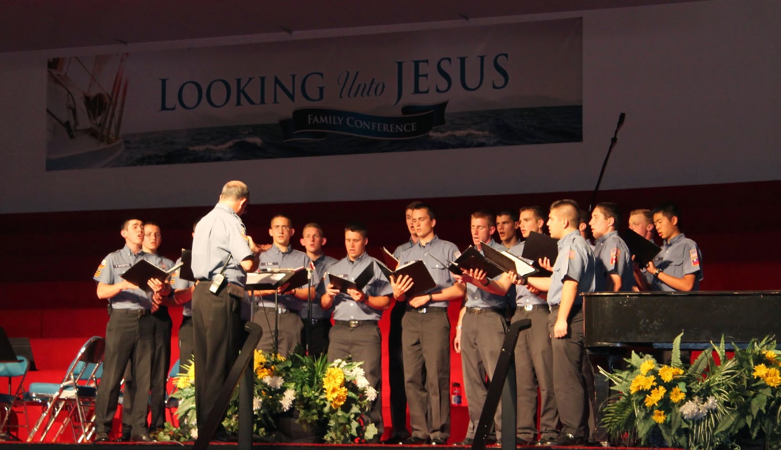 A group of ALERT men singing "In God We Trust"