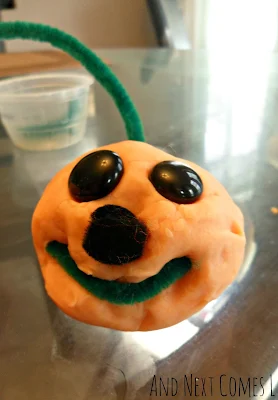 Play dough jack-o-lanterns for Halloween fun from And Next Comes L