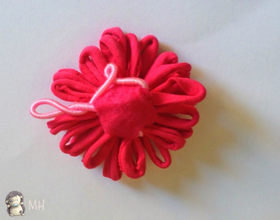 Parte trasera de coletero con flor de trapillo