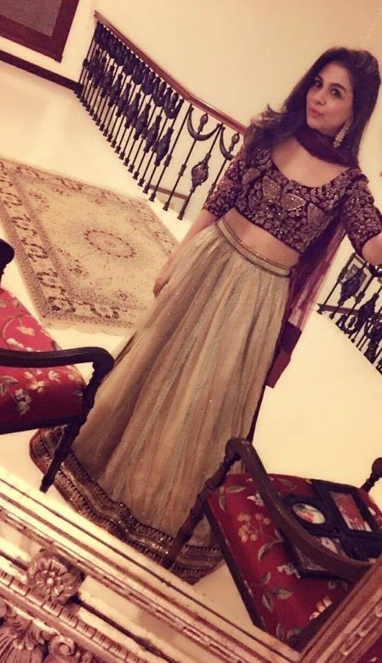 Maroon velvet choli with a gold lengha by Sehrish Rehan Pakistani formalwear by Sehrish Rehan