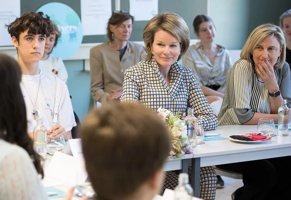 Queen Mathilde of Belgium visited the Maria Boodschap Lyceum, a catholic school for secondary education in Brussels for program Conflixers