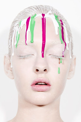 woman with paint dripping down face, beauty