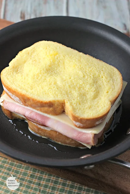 Monte Cristo Style Grilled Cheese Sandwich in pan