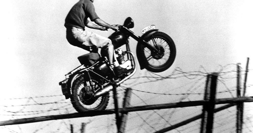 Image result for photo of steve mcqueen on motorbike jumping fence