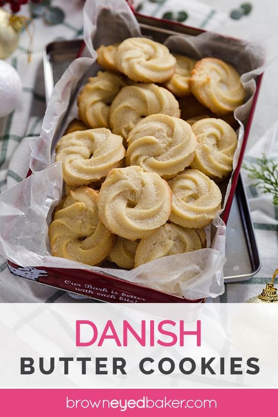 These Danish Butter Cookies taste just like the ones in the iconic Royal Dansk blue tin; this simple recipe makes the best piped butter cookies! #cookies #dessert #christmas #holidays #christmascookies #holidaycookies #buttercookies