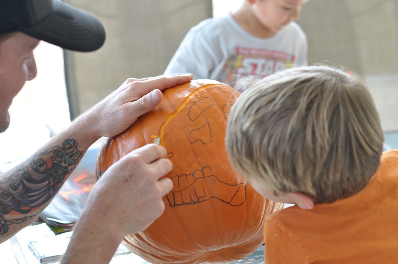 brown-bobbin-pumpkin-carving-and-football-helmets