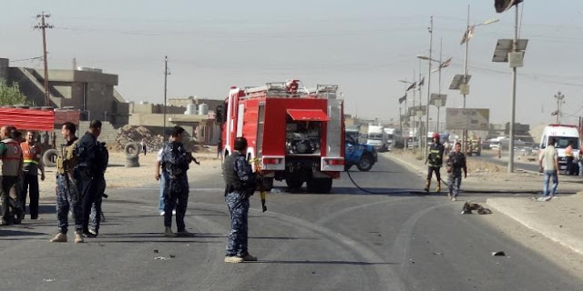 Polisi Irak mengamankan jalan raya yang menghubungkan Baghdad dan kota Suleiman Bek lokasi pembunuhan 14 pengemudi truk Syiah oleh kelompok militan Sunni