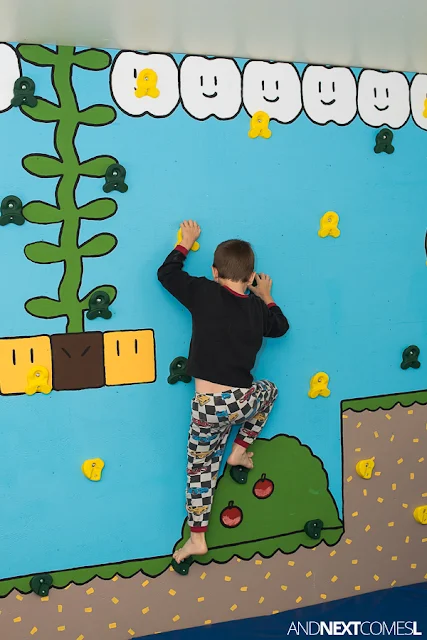 Find out how to build a climbing wall indoors for kids with this DIY Super Mario themed climbing wall tutorial