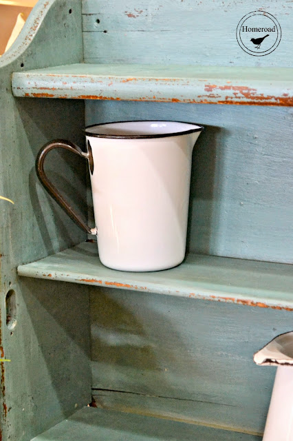 Antique shelf with mug