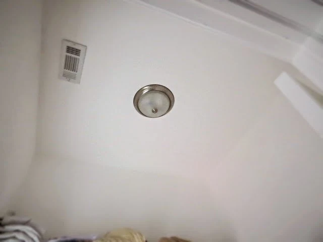 old boob light in closet