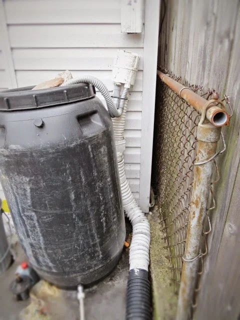 downspout repair replace rain barrel