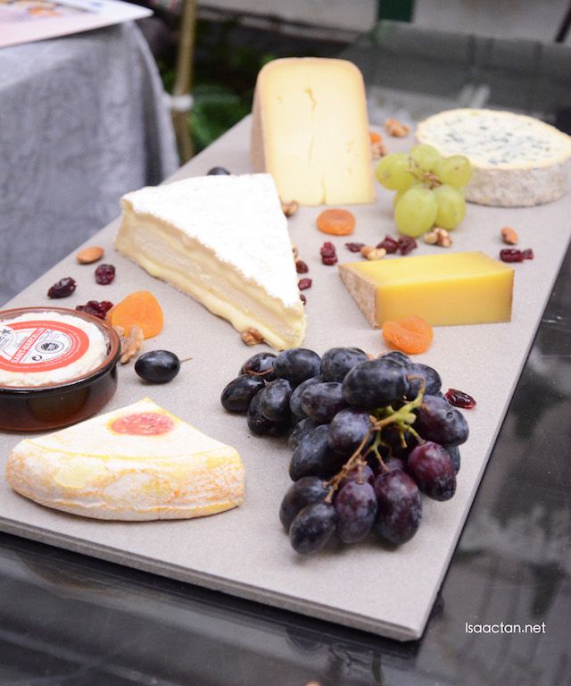 A classic cheese platter with condiments 