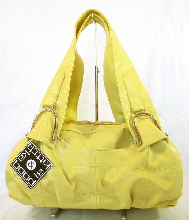 Elegance of living Yellow Handbags
