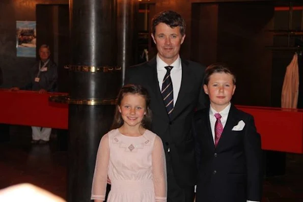 Queen Margrethe, Crown Prince Frederik with his children Prince Christian and Princess Isabella, Prince Joachim, his son Prince Felix and Princess Marie at unveiling of sculpture at Royal Theatre