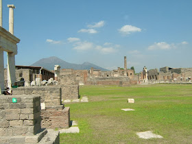 The ruins of the forum at Pompei with a now dormant Vesuvius visible in the distance