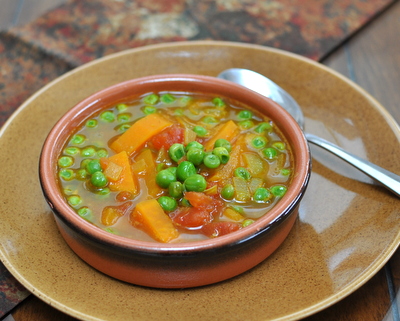 East African Pea Soup ♥ AVeggieVenture.com, a great bowl of spicy vegan soup, just sweet potato, frozen peas and pantry spices.