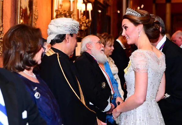 The Duchess of Cambridge wearing Lover's Knot tiara with a pale blue, fitted bespoke Jenny Packham gown