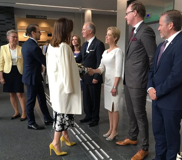 Crown Princess Mary wore Gianvito Rossi Pumps in Yellow, floral printed dress. Crown princess Victoria wore silk blouse