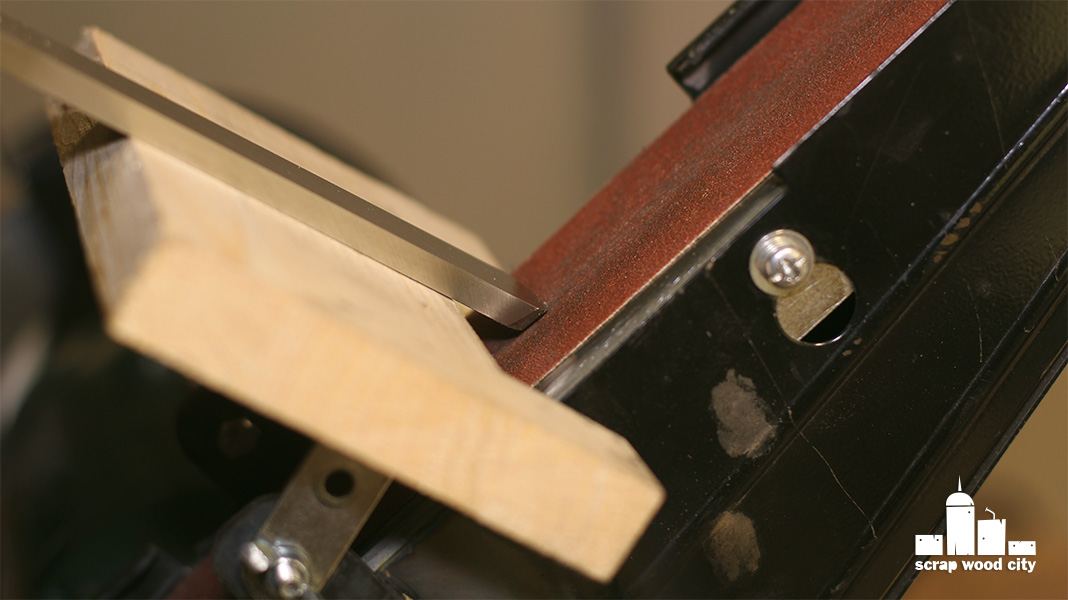 scrap wood city DIY tool rest for sharpening with the vertical belt sander