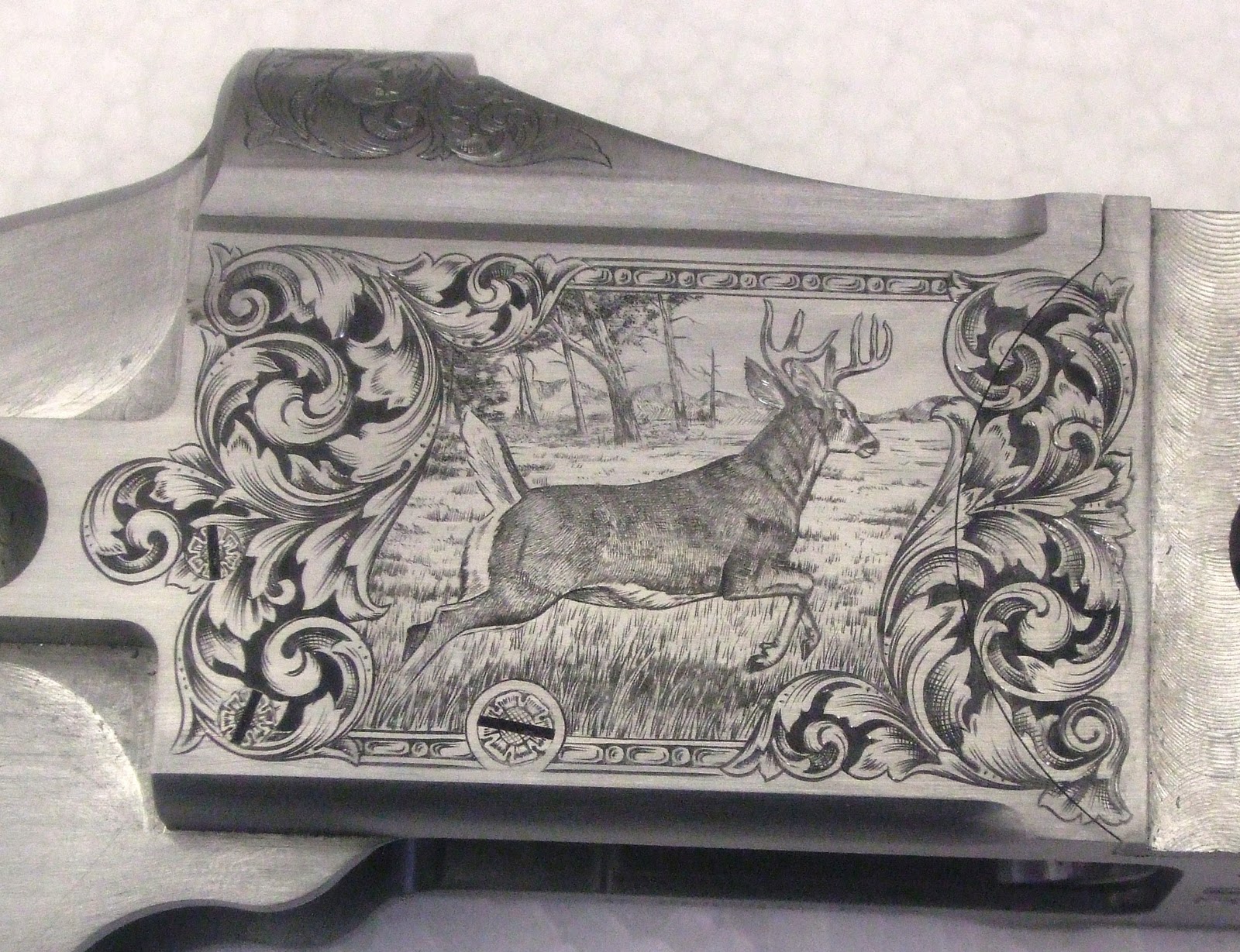 Gary Griffiths Gun Engraving Luxus receiver w/whitetail and mule deer