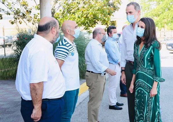 Queen Letizia wore a scarf print long dress from Sandro, and espadrille wedges from Macarena. Queen Letizia wore Sandro long dress