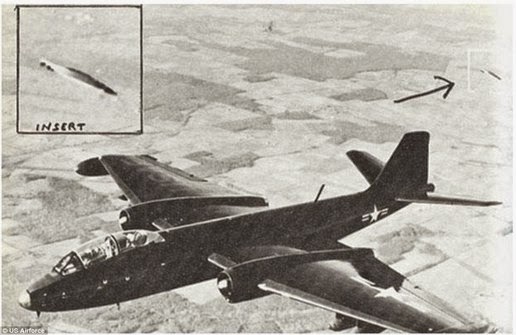 Photo taken in 1957 by test pilot near Edwards Air Force Base in California that shows the UFO followed the jet B-47. Photo taken in 1957 by test pilot near Edwards Air Force Base in California that shows the UFO followed the jet B-47.