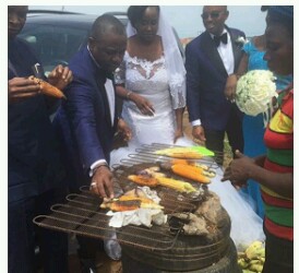 Married couples eating corn after weeding from church 