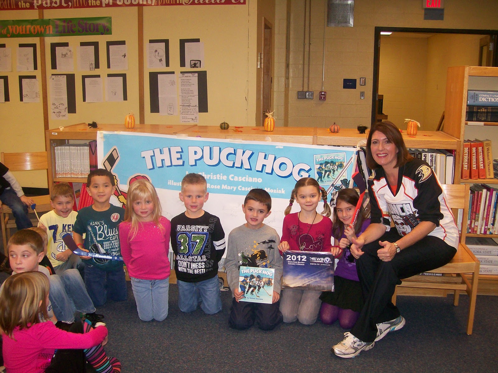 Syracuse Hockey Mom's Network Reading and Scoring at