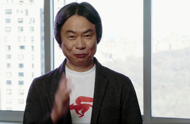 Shigeru Miyamoto with a Star Fox shirt Shigeru Miyamoto Star Fox Zero shirt pout face