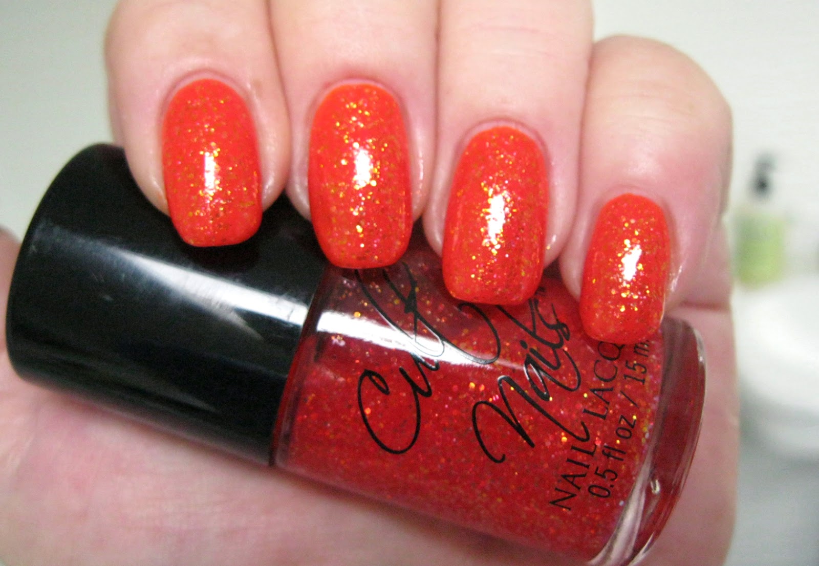 10. Orly Nail Lacquer in "Orange Punch" - wide 7